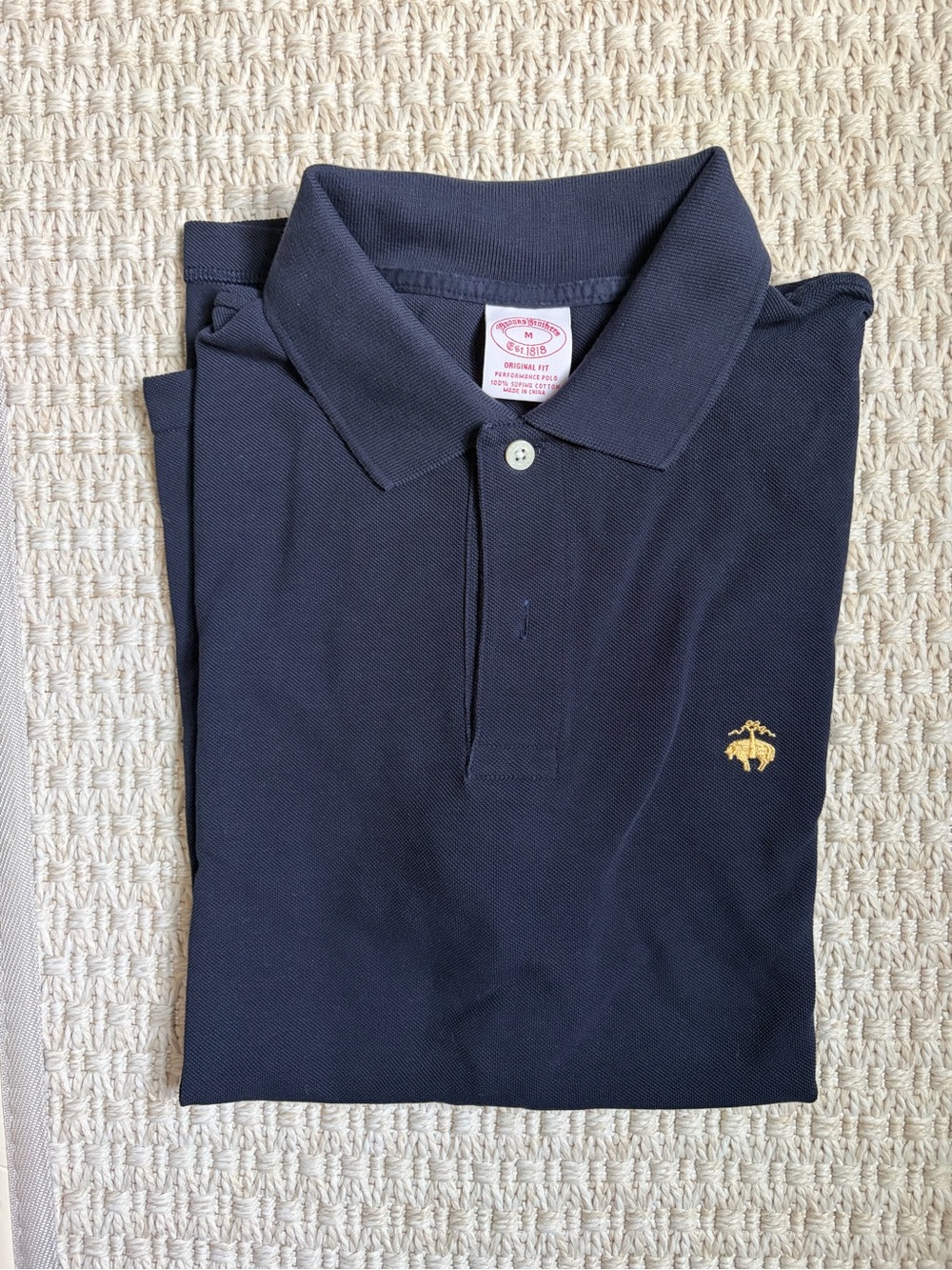 Like new Brooks Brothers Navy Polo with Gold Emblem